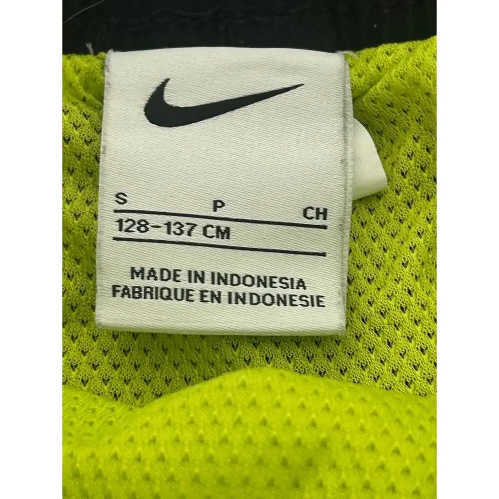 Nike boys size small Volley shorts black with bright green swoosh